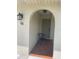 Charming entryway with arched doorway, brick floor, and a cozy seating area, number 48 at 48 Dade Ave, Sarasota, FL 34232