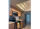 Modern kitchen featuring stainless steel appliances and light wood cabinetry at 48 Dade Ave, Sarasota, FL 34232