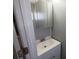 Small half bathroom shows vanity with mirror at 5118 Oakland Hills Ave, Sarasota, FL 34234