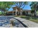 Exterior of clubhouse with lush landscaping, ample parking, and beautiful architectural details at 518 Chantilly Trl, Bradenton, FL 34212