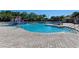 Large community pool with water slide and splash pad for hours of fun and entertainment at 518 Chantilly Trl, Bradenton, FL 34212