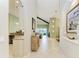 Hallway view into living area showcasing tall ceilings and a modern open floorplan at 518 Chantilly Trl, Bradenton, FL 34212