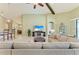 View of the open floorplan living room featuring tall ceilings, kitchen and dining area at 518 Chantilly Trl, Bradenton, FL 34212