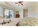 Bright and airy main bedroom with outdoor access to the lanai at 518 Chantilly Trl, Bradenton, FL 34212