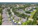 Aerial view showcasing the community layout, landscaping, and proximity to local amenities at 6222 Country Club Way, Sarasota, FL 34243