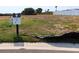 Vacant homesite lot showing lot number 71 with a view of potential home placement at 651 Maldives Trl, Sarasota, FL 34234