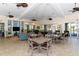 Bright clubhouse with seating, entertainment area, and billiards for residents to enjoy at 6552 Moorings Point Cir # 201, Lakewood Ranch, FL 34202