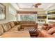 Comfortable living room with seating, a ceiling fan, and a view at 6552 Moorings Point Cir # 201, Lakewood Ranch, FL 34202