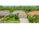 Charming single-story home with a well-manicured lawn and a three-car garage in a lush neighborhood at 7126 Southgate Ct, Sarasota, FL 34243
