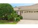 Charming single-story home with a three-car garage, manicured landscaping, and a well-lit address at 7126 Southgate Ct, Sarasota, FL 34243