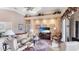 Comfortable living room showcases a large sofa, chairs, and a wall unit with a TV at 7126 Southgate Ct, Sarasota, FL 34243