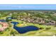 Lush community featuring a pool, lakes, and golf course at 7160 Cedar Hollow Cir, Bradenton, FL 34203