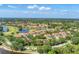 Expansive community view highlighting lush greenery, serene lakes, and beautifully landscaped homes at 7160 Cedar Hollow Cir, Bradenton, FL 34203