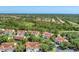 Beautiful aerial view of the community with mature trees and manicured lawns at 7160 Cedar Hollow Cir, Bradenton, FL 34203