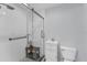 Modern tiled bathroom with glass shower, white vanity and toilet at 7160 Cedar Hollow Cir, Bradenton, FL 34203