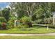 Welcome to The Preserve, featuring lush tropical landscaping and a charming entrance sign at 7160 Cedar Hollow Cir, Bradenton, FL 34203