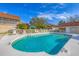 Inviting community pool with clear blue water, lounge seating and meticulously kept grounds offers a tranquil outdoor space at 7160 Cedar Hollow Cir, Bradenton, FL 34203