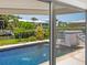Beautiful pool and spa area overlooking the canal at 7779 Holiday N Dr, Sarasota, FL 34231