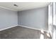 The bedroom has carpet and features new paint at 800 S Blvd Of The Presidents # 5, Sarasota, FL 34236