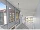 Upstairs view features foyer and views from large windows at 800 S Blvd Of The Presidents # 5, Sarasota, FL 34236