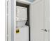 Conveniently located stacked washer and dryer unit in a small closet at 800 S Blvd Of The Presidents # 5, Sarasota, FL 34236