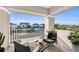 Balcony with seating and community views at 8273 Shooting Star Rd, Sarasota, FL 34241
