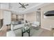 Comfortable upstairs sitting area with a plush sofa, stylish decor, and ample natural light at 8273 Shooting Star Rd, Sarasota, FL 34241