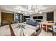 Modern game room with air hockey table, foosball table, pendant lighting and comfortable seating at 8273 Shooting Star Rd, Sarasota, FL 34241
