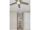 Hallway featuring neutral colored walls and carpet, and access to multiple rooms at 8273 Shooting Star Rd, Sarasota, FL 34241