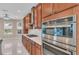 Kitchen with stainless steel appliances, gas range, and granite countertops at 8273 Shooting Star Rd, Sarasota, FL 34241