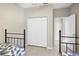 Bright bedroom featuring two twin beds, and neutral wall color at 8525 54Th Avenue E Cir, Bradenton, FL 34211