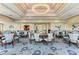 Bright dining area with multiple tables and chairs at 8525 54Th Avenue E Cir, Bradenton, FL 34211
