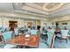 Comfortable dining area featuring multiple tables and chairs at 8525 54Th Avenue E Cir, Bradenton, FL 34211