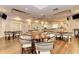 Dining area featuring a large table and multiple chairs at 8525 54Th Avenue E Cir, Bradenton, FL 34211