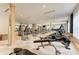 Bright fitness center with state-of-the-art equipment, mirrors, and ample space for a comprehensive workout at 8525 54Th Avenue E Cir, Bradenton, FL 34211