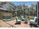 Screened lanai with a hot tub and seating area offering lovely views at 8525 54Th Avenue E Cir, Bradenton, FL 34211