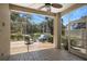 Relaxing screened lanai with seating, offering serene views of the water and landscaped surroundings at 8525 54Th Avenue E Cir, Bradenton, FL 34211
