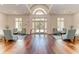 Inviting lobby with wood floors, stylish seating, and bright, welcoming entrance at 8525 54Th Avenue E Cir, Bradenton, FL 34211