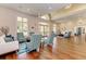 Bright lobby with stylish seating, wood floors, and a welcoming ambiance at 8525 54Th Avenue E Cir, Bradenton, FL 34211