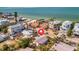 Beach house in a neighborhood close to a resort with multiple pools, with the Gulf in the background at 880 N Shore Dr, Anna Maria, FL 34216