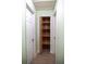 Hallway closet with cedar interior and folding door at 1004 65Th W Ave, Bradenton, FL 34207