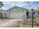 Home with a garage, nice yard, and an inviting exterior at 1004 65Th W Ave, Bradenton, FL 34207