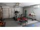 Well-organized garage with equipment and work area at 1004 65Th W Ave, Bradenton, FL 34207