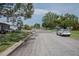 Quiet residential street with well-maintained homes and green lawns at 1004 65Th W Ave, Bradenton, FL 34207