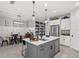 Spacious kitchen features a center island, stainless appliances and is open to the adjacent dining room at 10120 Canaveral Cir, Sarasota, FL 34241