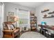 Cozy study with comfortable seating, a desk, and natural light, perfect for reading or home office tasks at 10120 Canaveral Cir, Sarasota, FL 34241