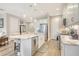 Spacious kitchen with stainless steel appliances, a large island, and ample counter space at 10186 Crystal Isle Cir, Sarasota, FL 34241