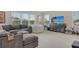 Bright, oversized living room featuring comfortable seating, and built-in entertainment center at 10186 Crystal Isle Cir, Sarasota, FL 34241