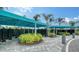 Organized mailbox area with covered structures and landscaping at 10186 Crystal Isle Cir, Sarasota, FL 34241