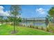 Two new fenced pickleball courts nestled within lush landscaping in a vibrant community at 10186 Crystal Isle Cir, Sarasota, FL 34241